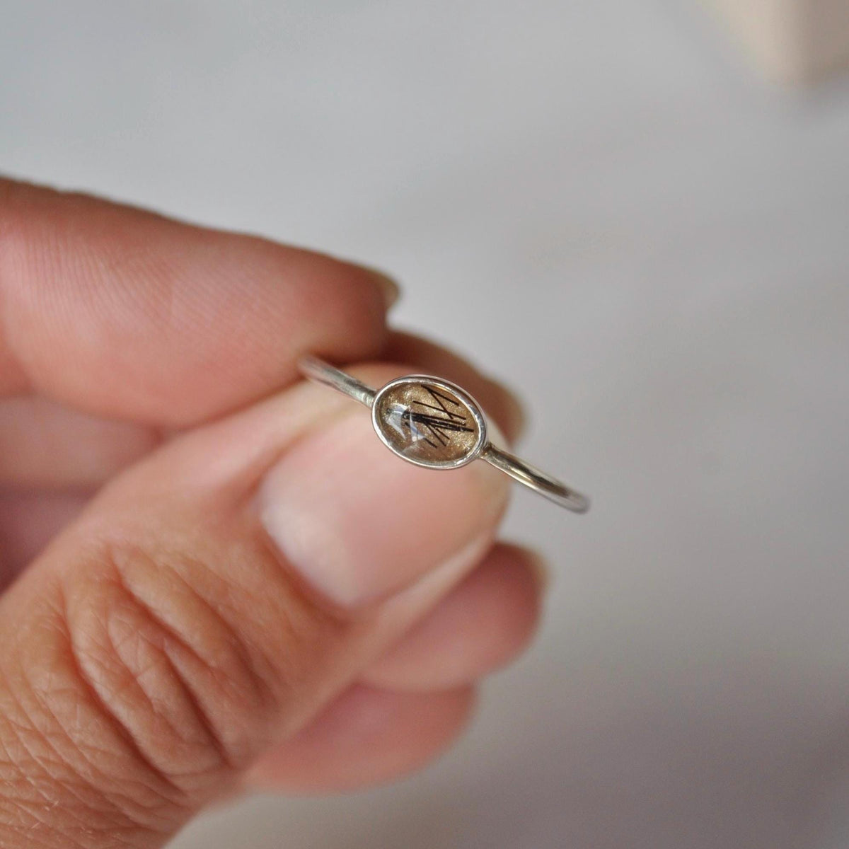 Small oval sterling silver ring containing pet hair | Mila Faith